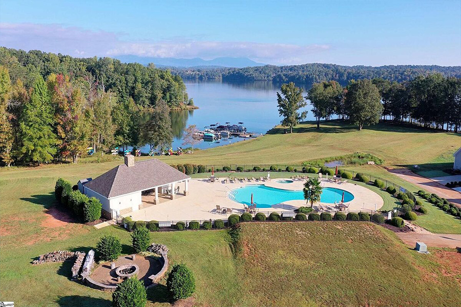 04 2023 Aerial View Of A Community Pool And Lake Robinson